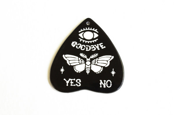 black planchette with eye, moth, goodbye, yes and no printed in white