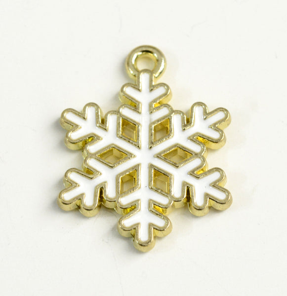 white enamel snowflake charm with gold tone outline