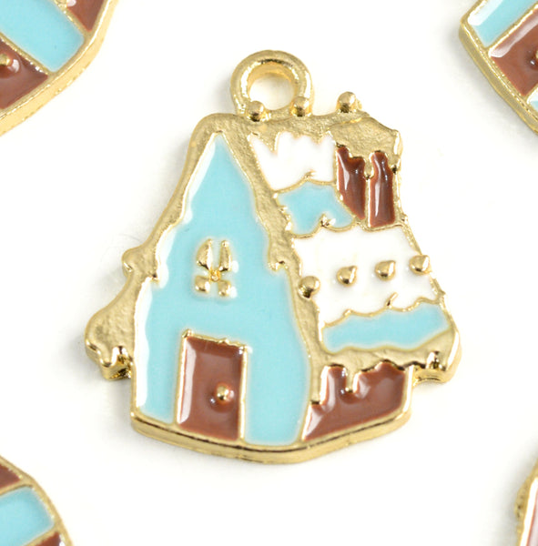 blue and brown gingerbread house charm with gold toned outline and accents