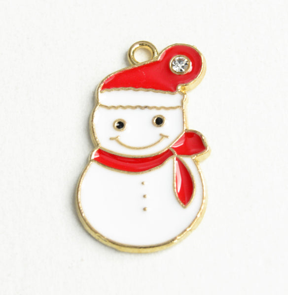 white snowman charm wearing a red scarf and a red hat with crystal rhinestone accent and gold toned metal detailing