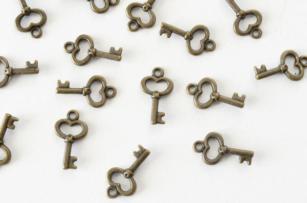 Small Key Charms, Antique Brass Heart Key Charm, 15.5 mm - 20 pieces ( –  Paper Dog Supply Co