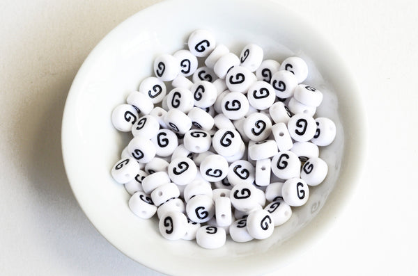 Letter G Plastic Alphabet Beads, White With Black Initial, 7mm x 3.5mm - 100 pieces (BTG)