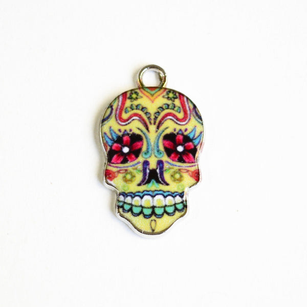 Colorful skull charm with flowers and designs 