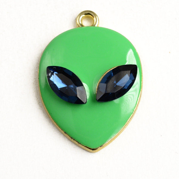 shiny green enamel alien face charms with dark blue rhinestone eyes